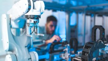 Male Engineers Maintenance Robot Arm at Lab. he are in a High Tech Research Laboratory with Modern Equipment. Technology and Innovation Concept.Professional. | Image credit: © anon - © anon - stock.adobe.com