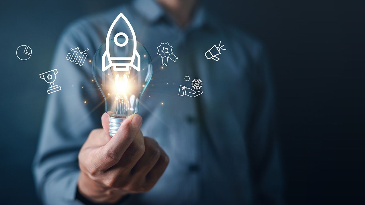 idea, light bulb, rocket, innovation, technology, business, development, imagination, inspiration, intelligence, hand hold light bulb to light up solution and advertise hit the goal and target rocket. | Image credit: © Garun Studios - stock.adobe.com
