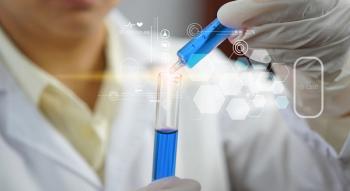 Scientist holding liquid biological sample | Image Credit: © fgnopporn - © fgnopporn - stock.adobe.com