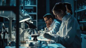 Two scientists working in a modern biopharmaceutical research laboratory analyzing experimental data and therapeutic development studies. | Image Credit: © 361 Portrait Studio - stock.adobe..com
