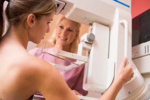 woman receiving mammogram