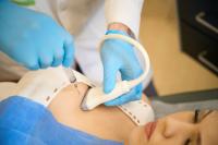 Doctor doing ultrasound-guided fine-needle aspiration cytology of mammary gland: © Svitlana - stock.adobe.com