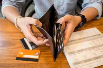 Patients with Cancer in Counties With Higher Medical Debt Have Worse OS Outcomes: © yingzaast - stock.adobe.com