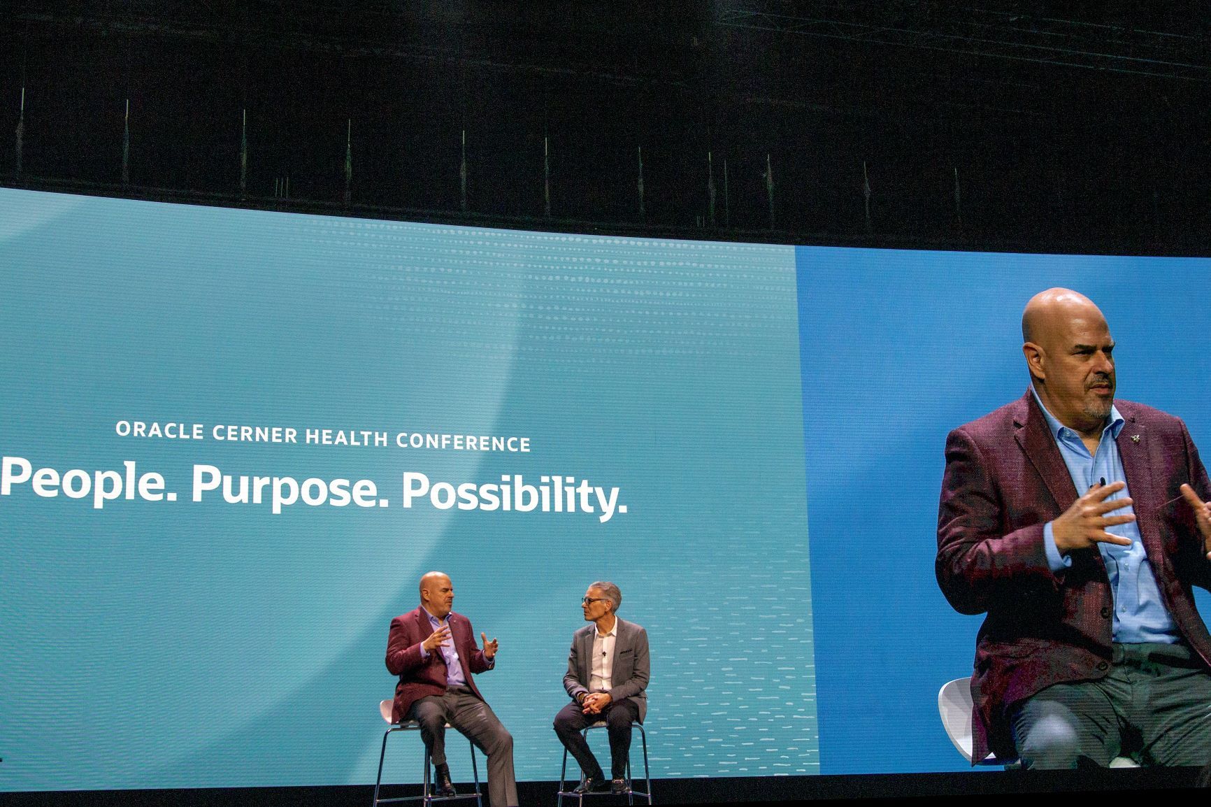 Mike Sicilia, left, and David Feinberg of Oracle Cerner talk about the company's focus on healthcare at the Oracle Cerner Health Conference in Kansas City, Mo. Monday. (Image by Oracle Cerner)