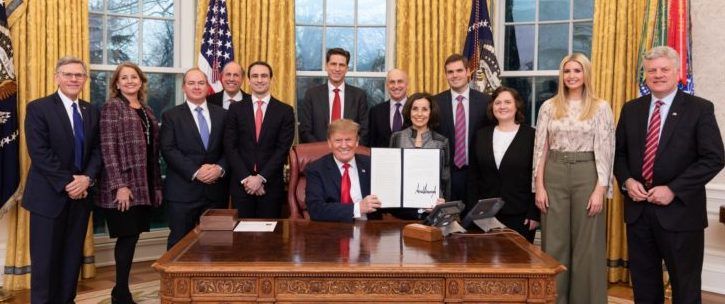 Trump signs AI executive order in Oval Office in February 2019. (Courtesy of the White House)