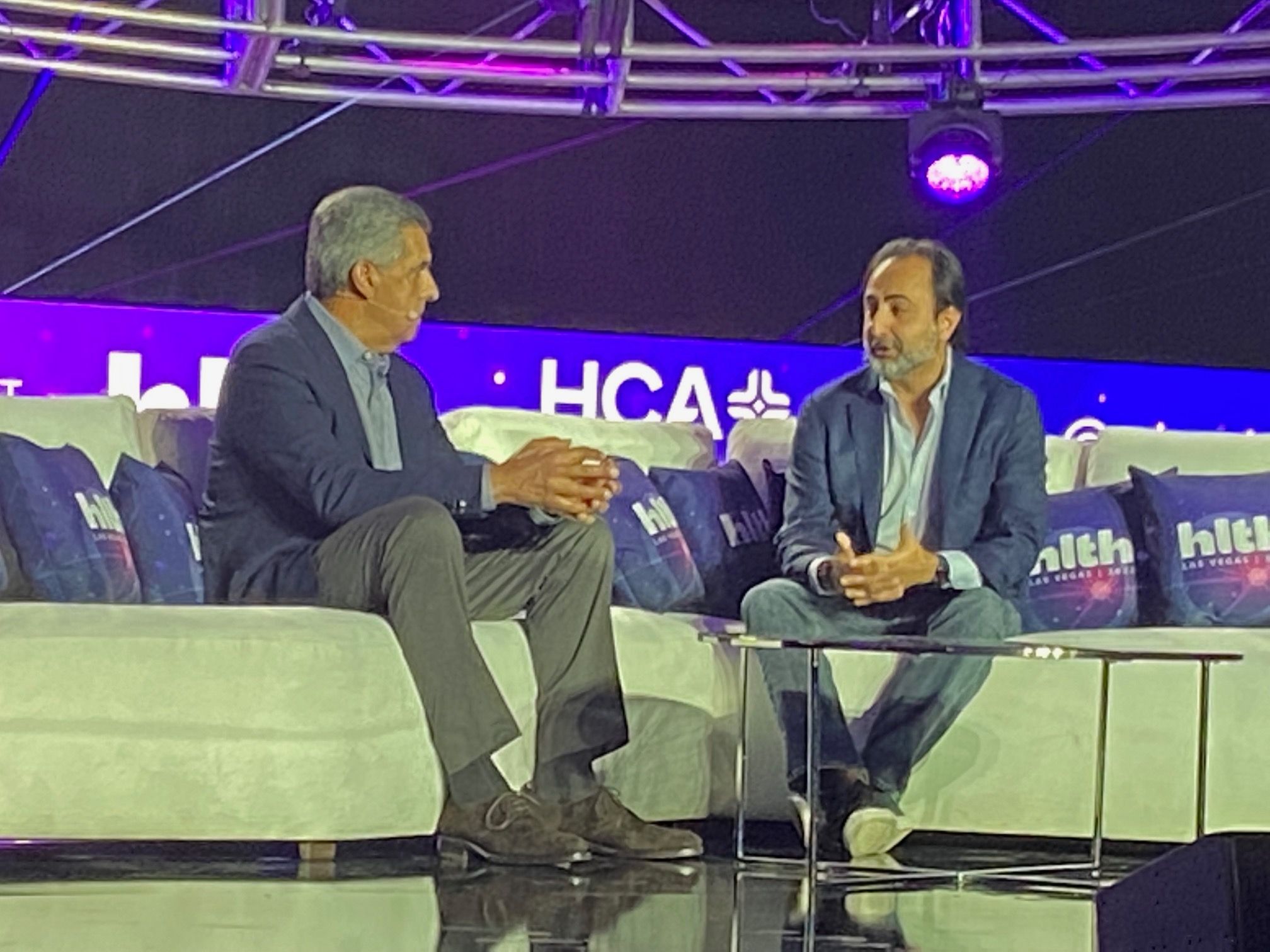 Sam Hazen, CEO of HCA Healthcare, left, talks with Hemant Taneja, CEO and managing partner of General Catalyst, at the HLTH Conference in Las Vegas, Sunday, Nov. 13. (Photo: Ron Southwick)