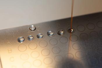 Pipetting of MALDI-TOF target in laboratory, mass-spectrometry | Image Credit: © Franz - stock.adobe.com