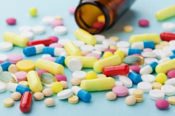 Pharmaceutical drugs against a blue background