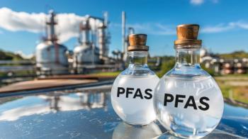 Warning sign PFAS on water samples from the river, pollution by industrial wastewater, concept of the harmful effects of chemicals on living organisms and health risk. Generated by AI. | Image Credit: © Anzhela - stock.adobe.com