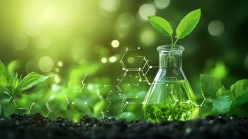 Green plant growing in a beaker with a green liquid with blurred green background and a chemnical structure overlay. Generated by AI. Credit: - © Fitryani - stock.adobe