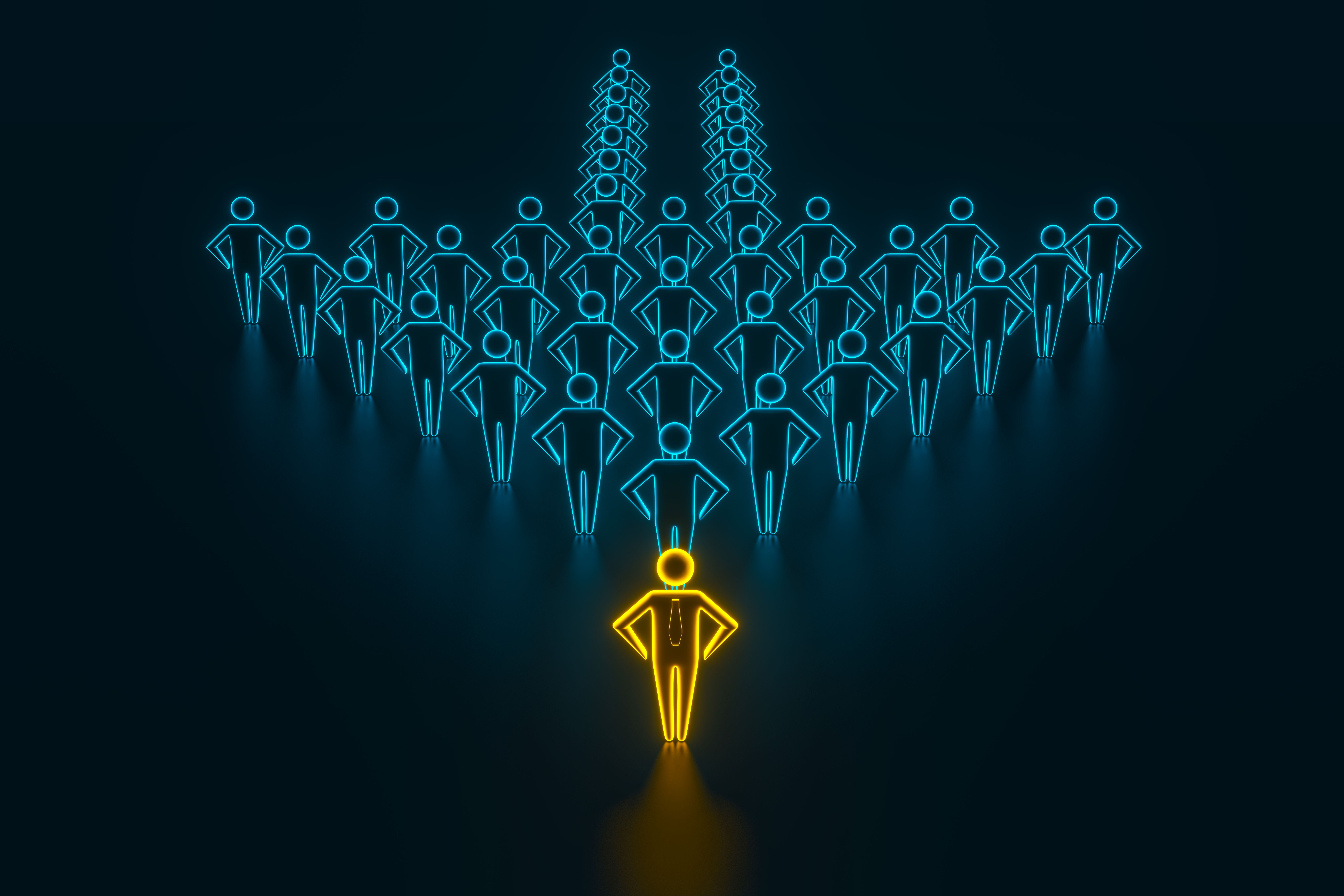Concept leader of the business team indicates the direction of the movement towards the goal. Crowd of blue men goes for the leader of the gold color. 3D rendering | Image Credit: © Dezaypro gmail com - stock.adobe.com