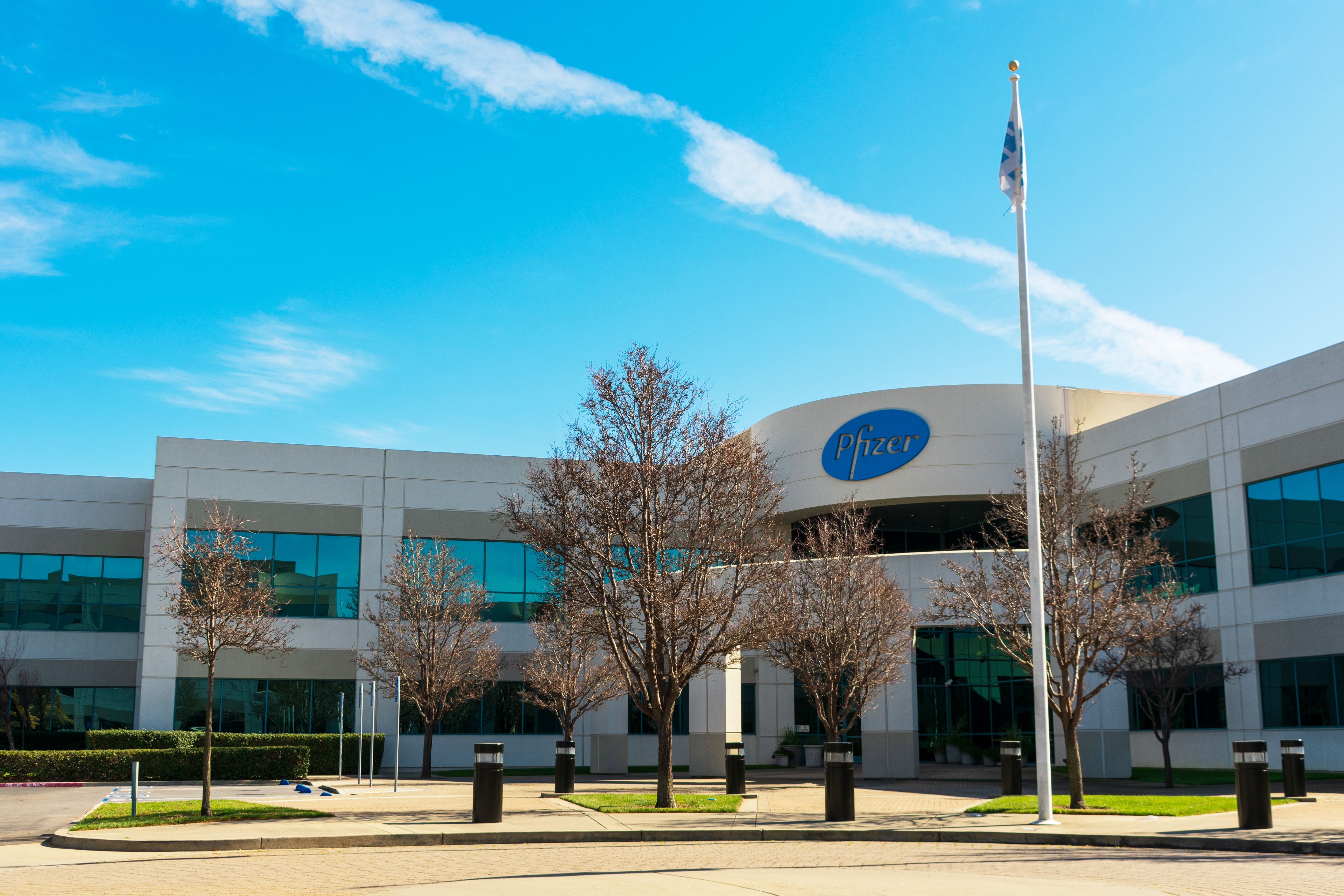 Pfizer pharmaceutical corporation campus exterior. Pfizer Inc. is a multinational pharmaceutical corporation headquartered in New York City - South San Francisco, CA, USA - 2020 | Image Credit: © MichaelVi - stock.adobe.com