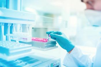 Close up of chemist scientist holding sample and examining test tube in special laboratory | Image Credit: © aboutmomentsimages - stock.adobe.com