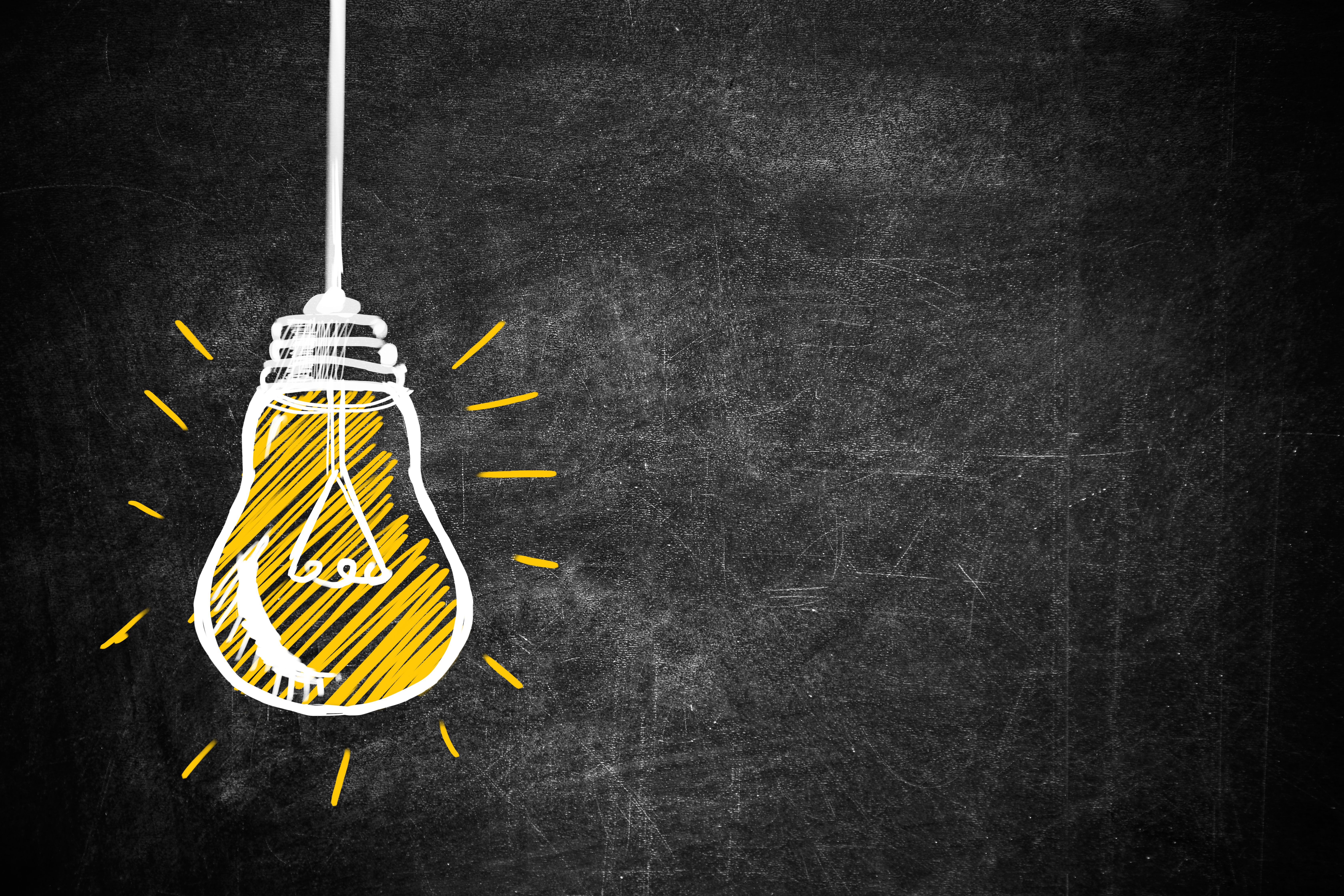 lightbulb against a black backdrop