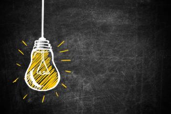 lightbulb against a black backdrop