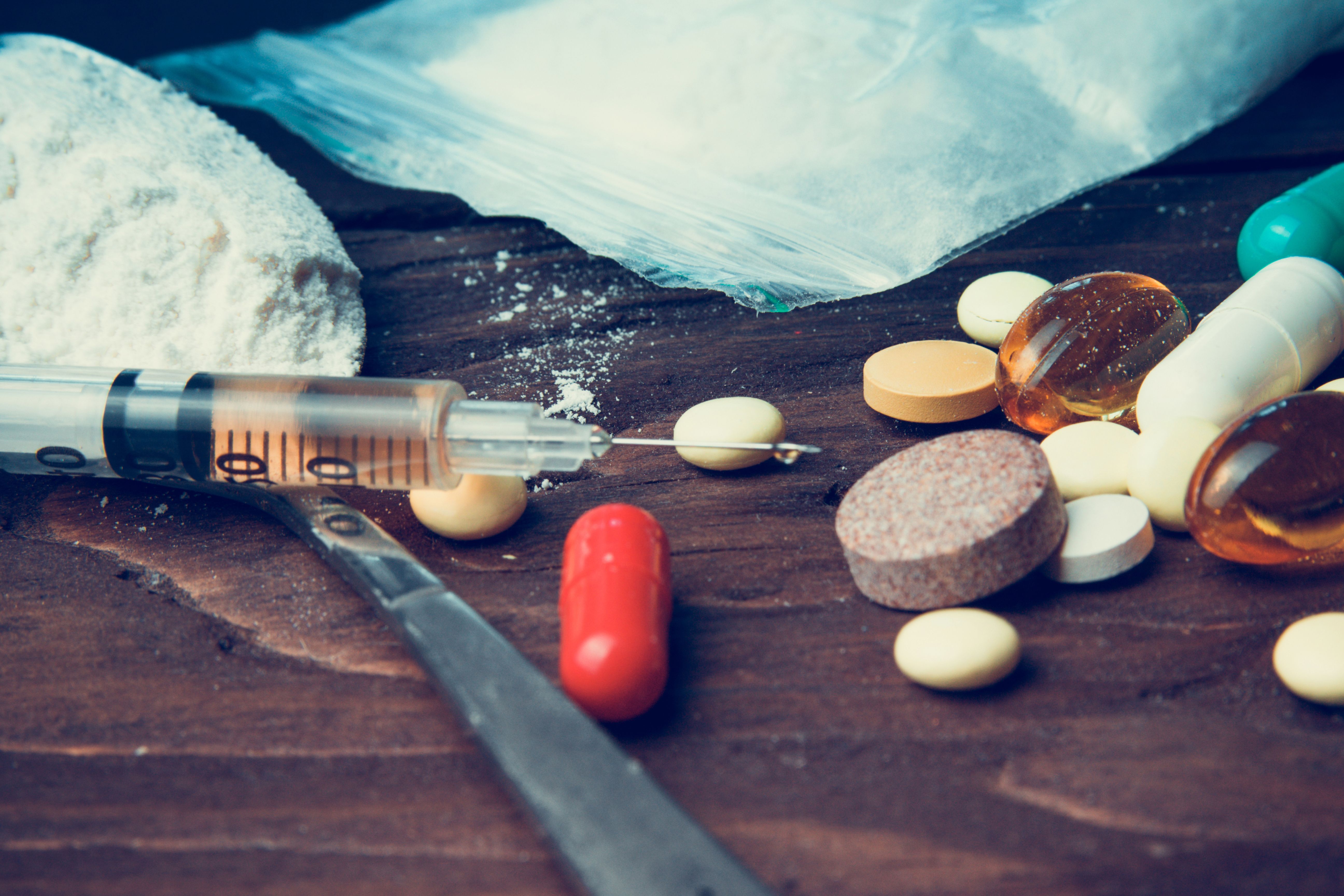 Drug concept. Use illicit Drug abuse. Addiction heroin. Injection, doping. Opium epidemic. Toning, selective focus. | Image Credit: © Stanislau_V - stock.adobe.com