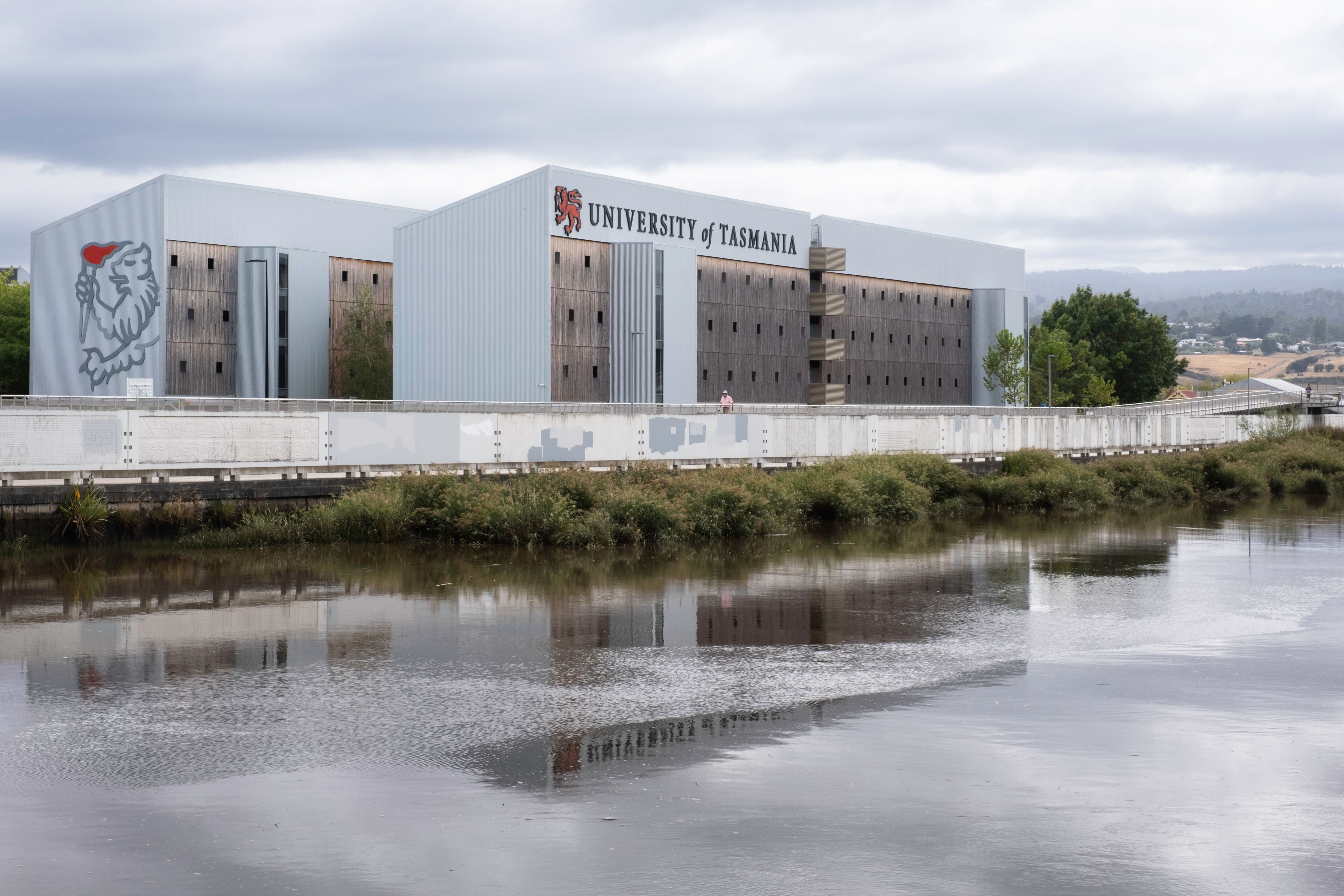 LAUNCESTON, TASMANIA, AUSTRALIA - MARCH 01 2023: University of Tasmania UTAS, Invermay Campus, mirrored in the Northern Esk River in Launceston. Australia's fourth oldest university | Image Credit: © Henk Vrieselaar - stock.adobe.com