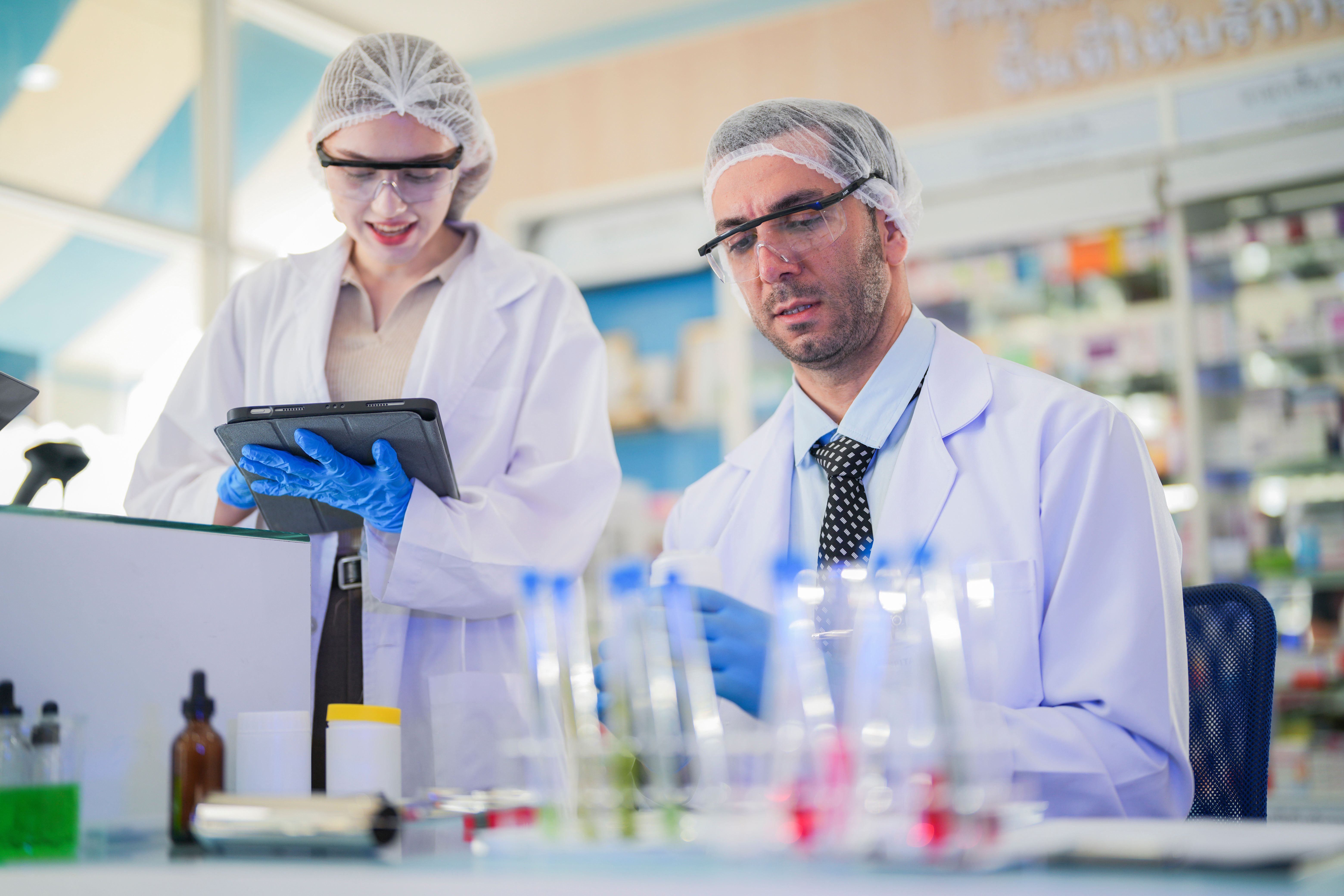 scientist doctors wear lab coat. Chemicals serums and antibiotics are being tested for treatment of people and animals. and make dietary supplements. product testing room clean in a modern laboratory. | Image Credit: © ultramansk - stock.adobe.com