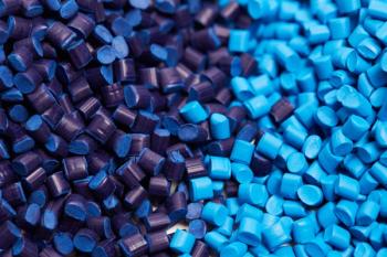 Close up of a two stacks of blue plastic polypropylene granules on a table | Image Credit: © LS Visuals - stock.adobe.com