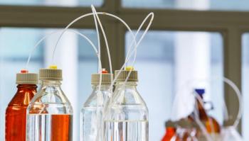 Glass bottle with plastic hose | Image Credit: © smuay - stock.adobe.com