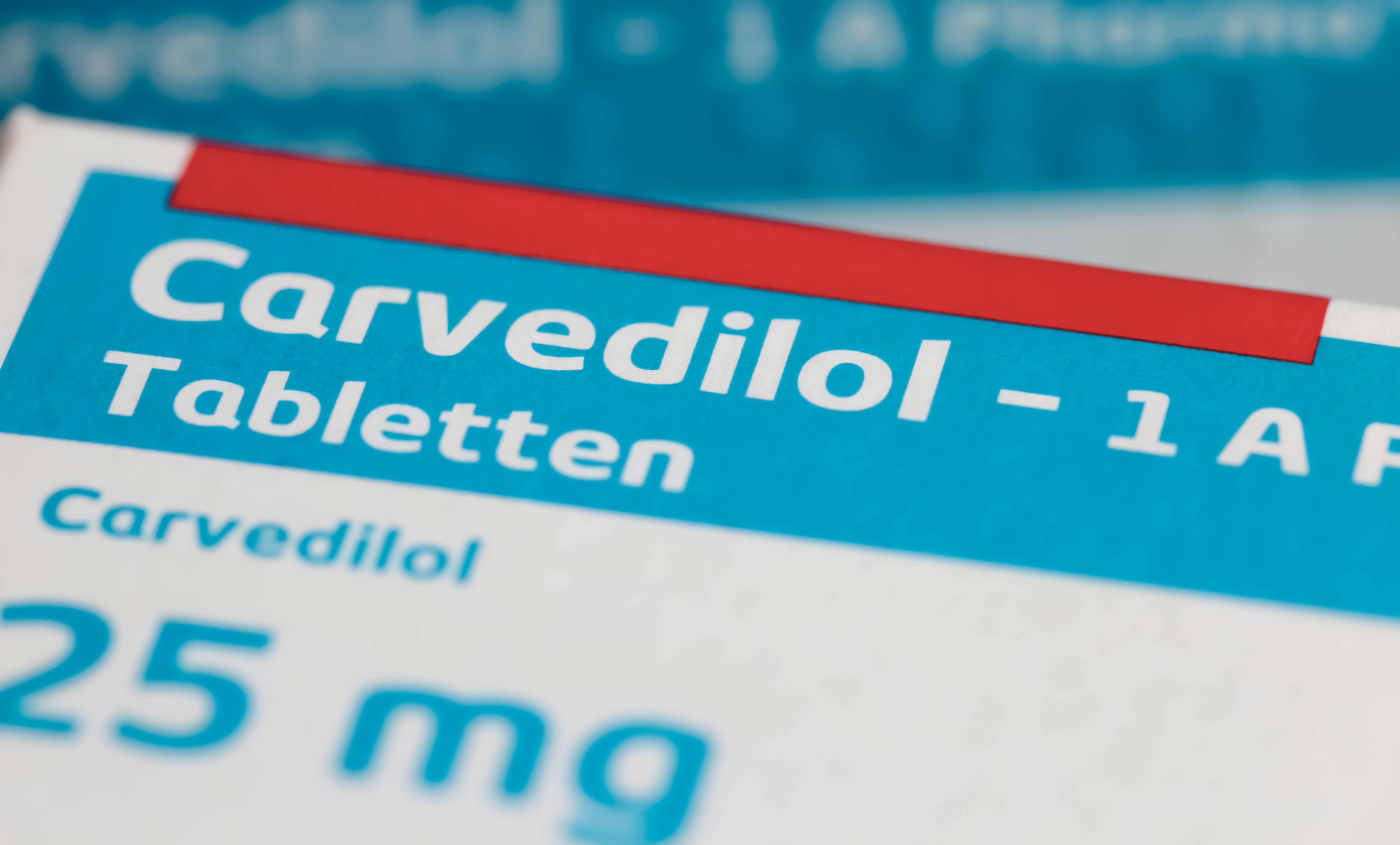 Viersen, Germany - July 9. 2023: Closeup of package Carvedilol alpha and beta blocker pills from 1 A pharma | Image Credit: © Ralf - stock.adobe.com