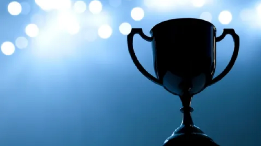 trophy against a dark blue background