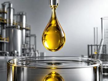 Golden drop representing sulfuric acid on a metal container in an industrial laboratory setting—chemistry, processing, and petrochemical production. | Image Credit: © Mariela - stock.adobe.com.