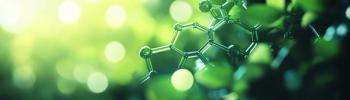 Close-up of a molecular structure amid lush green foliage, symbolizing the intersection of nature and science in sunlight © Chanwit - stock.adobe.com
