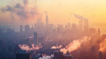 A panorama of a city skyline blanketed by smog, illustrating the impact of air pollution on urban environments. Generated with AI. | Image Credit: © Plaifah - stock.adobe.com