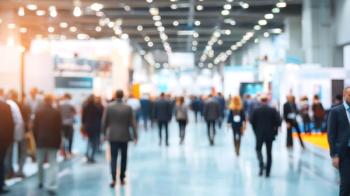 People attending a business conference or trade show | Image Credit: © setiadio - stock.adobe.com.