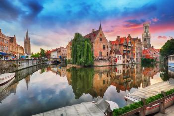 Bruges at dramatic sunset, Belgium | Image Credit: © TTstudio - stock.adobe.com.