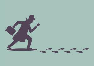 Silhouette of detective investigate is following footprints