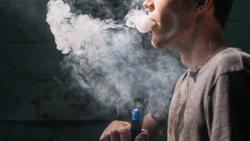 E-Cigarette Users at Higher Risk for Symptomatic COVID-19