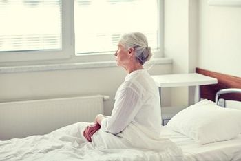 person sitting in a nursing home