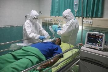 doctors working on a patient