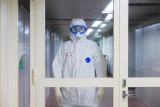 Donning and Doffing PPE for High-Consequence Infectious Disease Treatment
