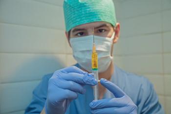 doctor with vaccine needle