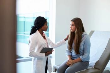doctor consoling patient