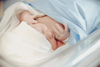 weighing a newborn baby