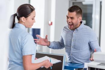 Your receptionist is facing patient aggression | Image Credit: © Lightfield Studios - © Lightfield Studios - stock.adobe.com.