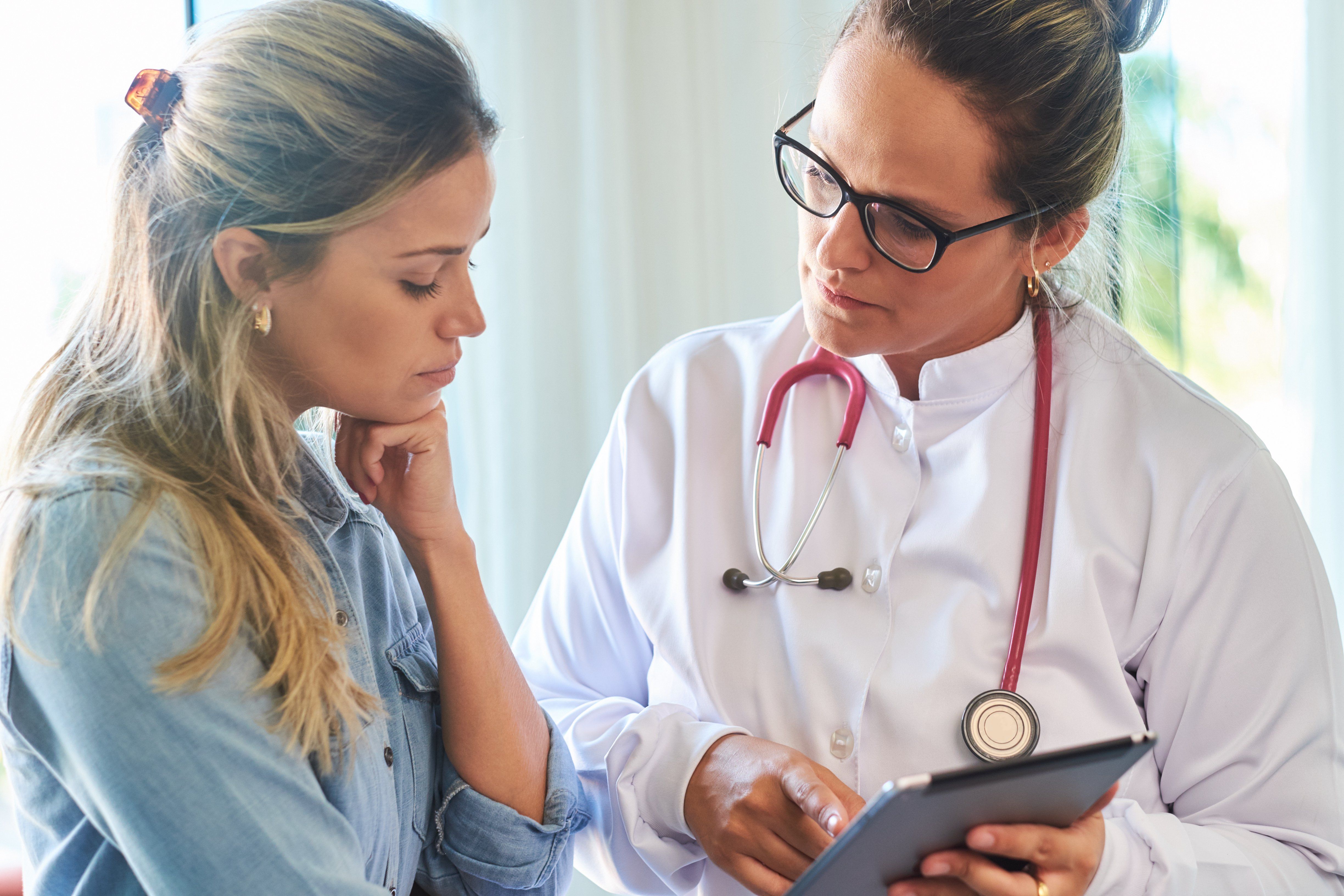 Doctor talking with patient