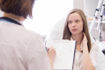 Adolescent with doctor
