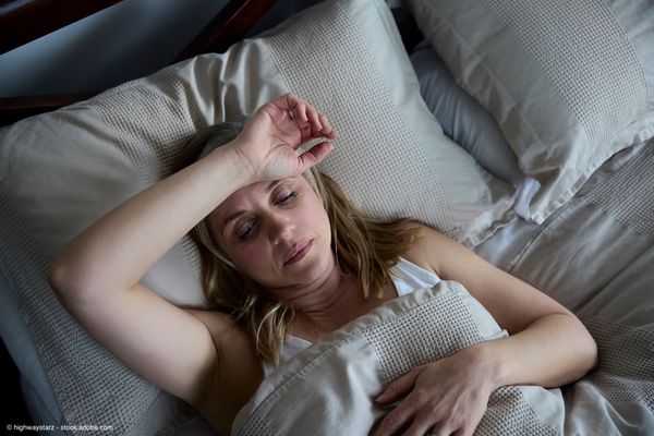 Menopausal Mature Woman Suffering With Insomnia In Bed At Home | Image Credit: © highwaystarz - stock.adobe.com