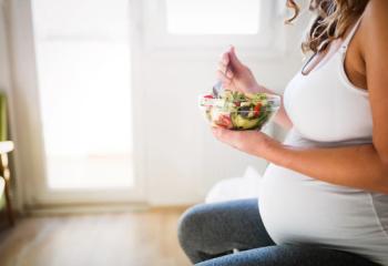 Pregnant woman eating