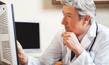 Male Doctor computer