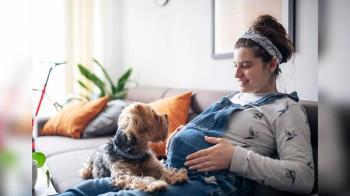 Pregnant woman and dog