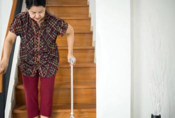 Woman walking down stairs