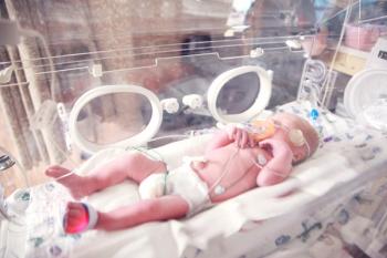 NICU premature infant in an isolette