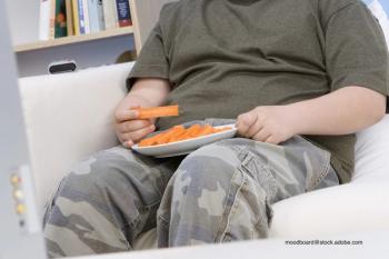 large child with carrot sticks