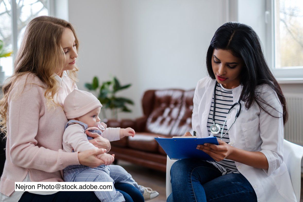 image of parent and pediatrician having a discussion